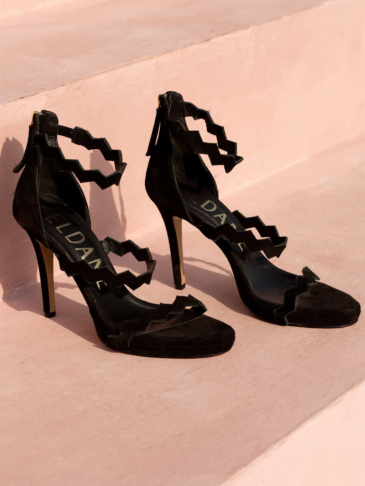 Heeled leather sandals in black