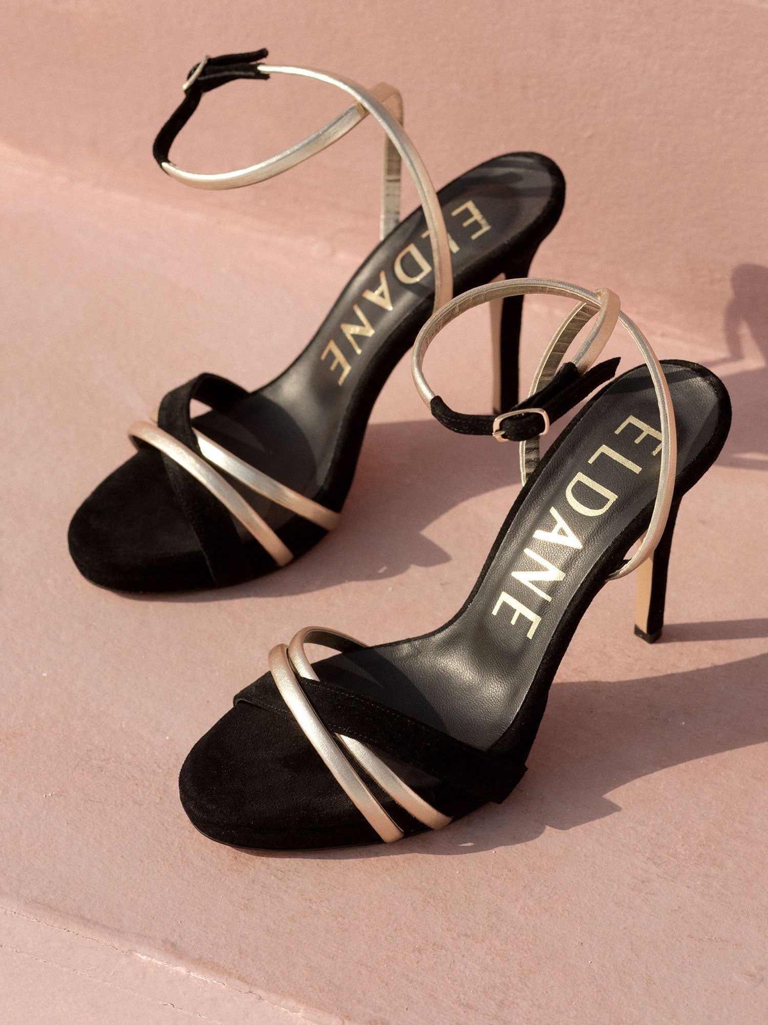 Heeled leather sandals in black