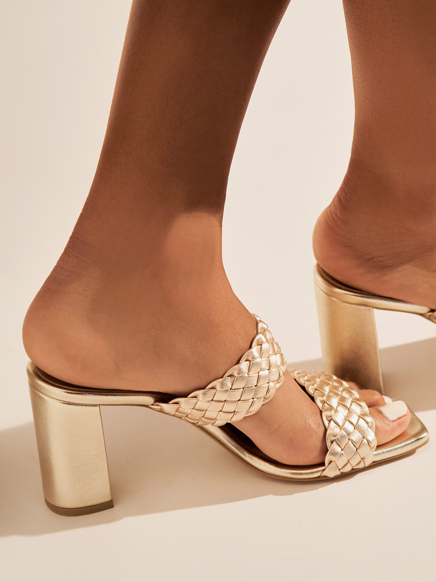 Block heel leather mules in gold