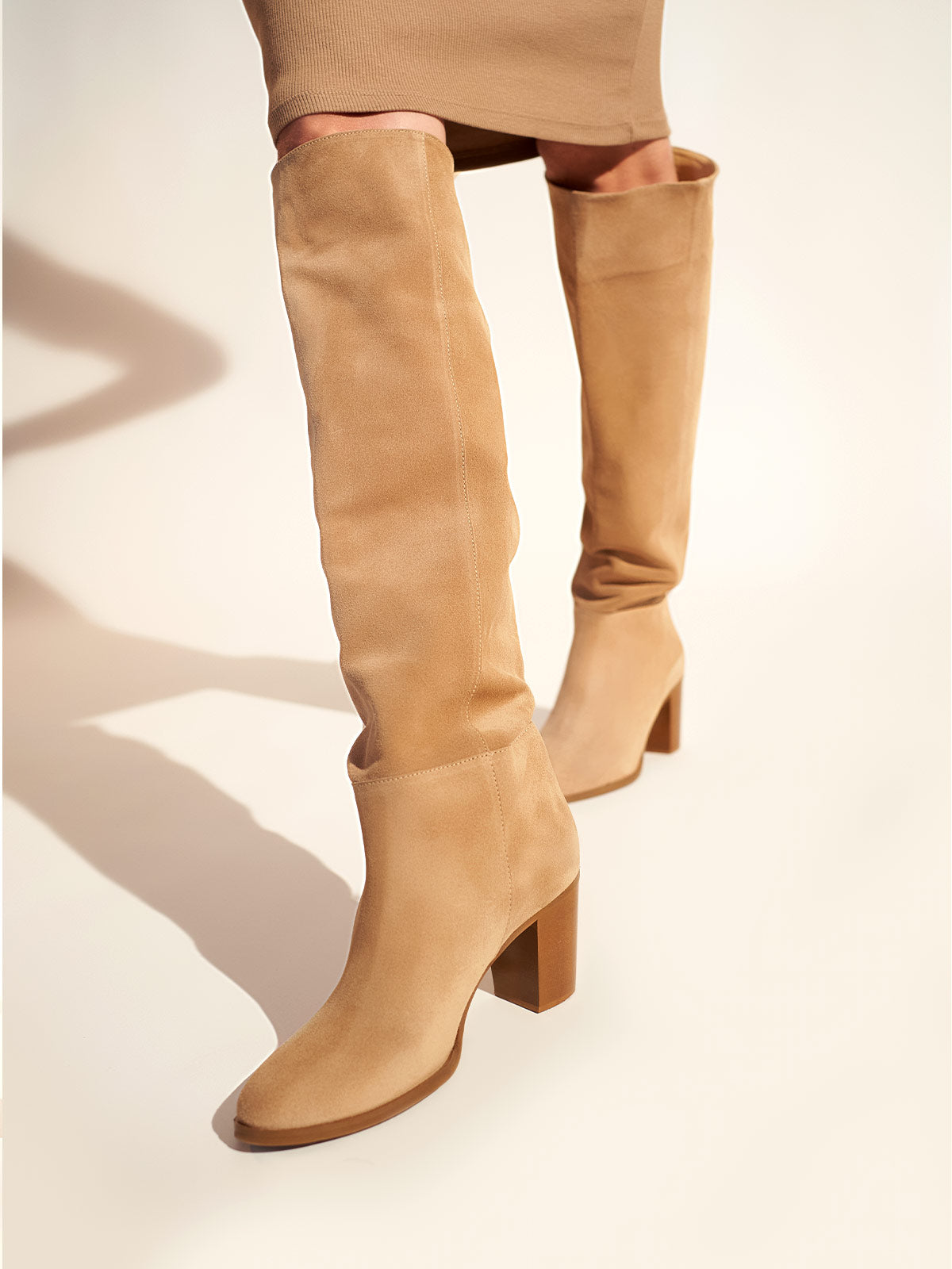 Block heel leather boots in beige