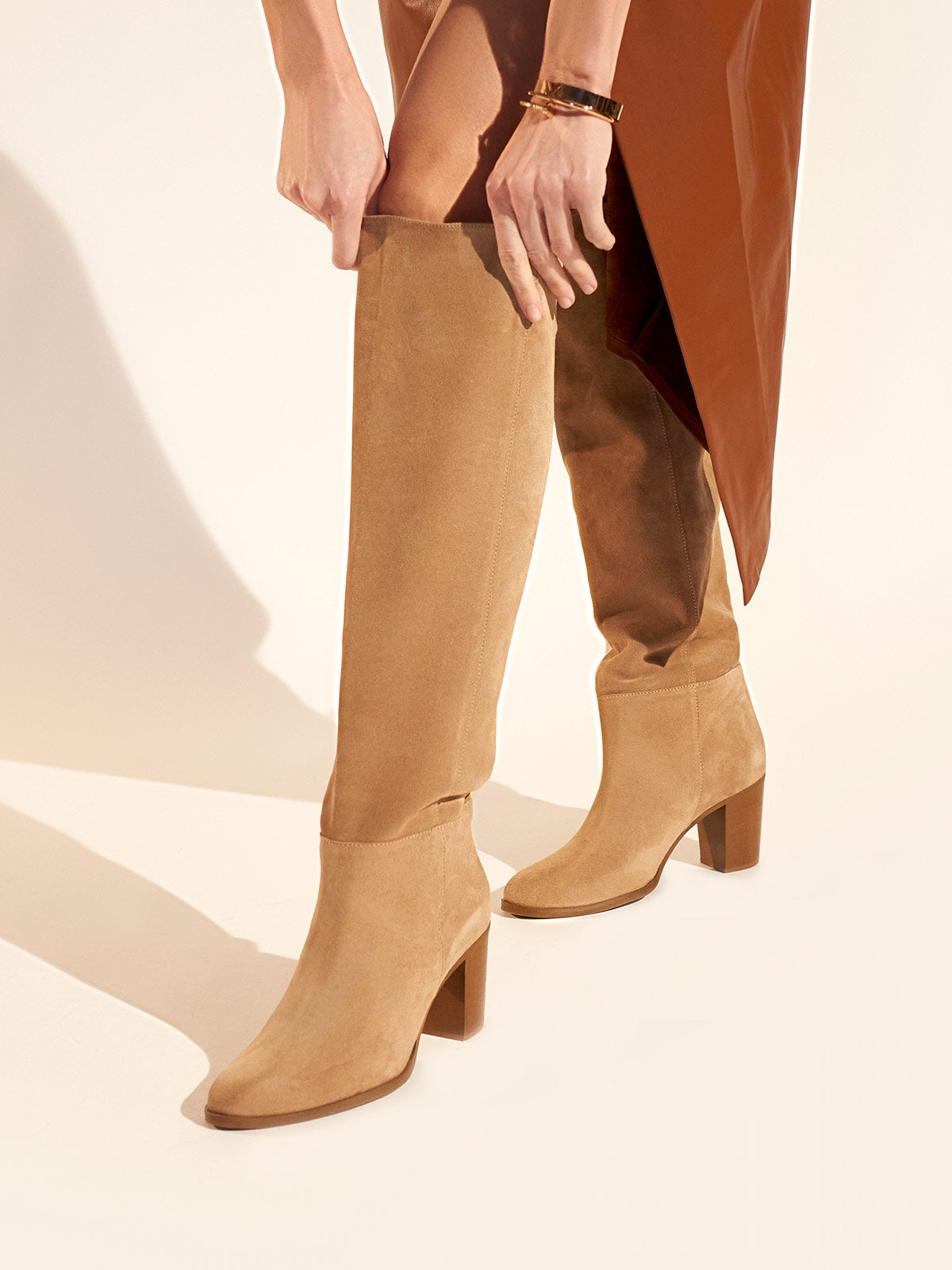 Block heel leather boots in beige