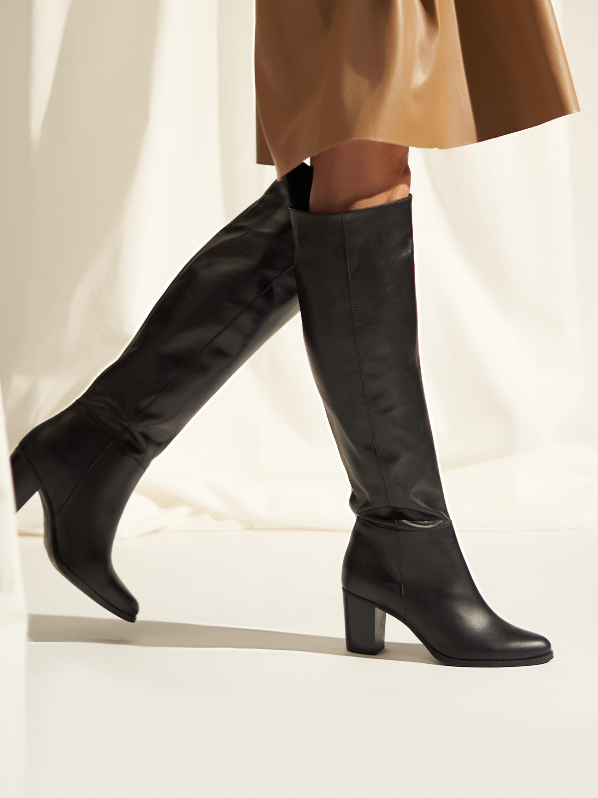 Block heel leather boots in black