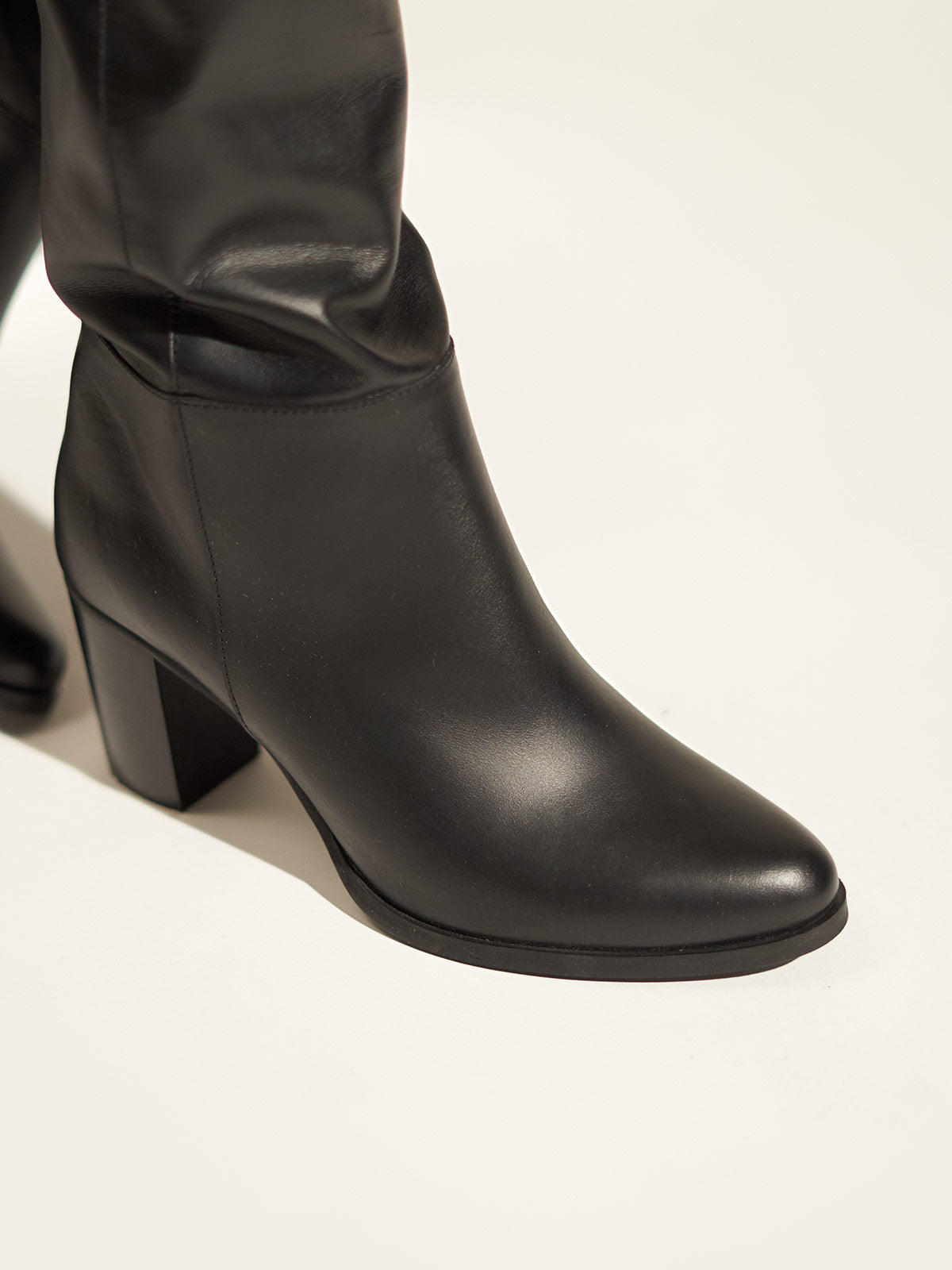 Block heel leather boots in black